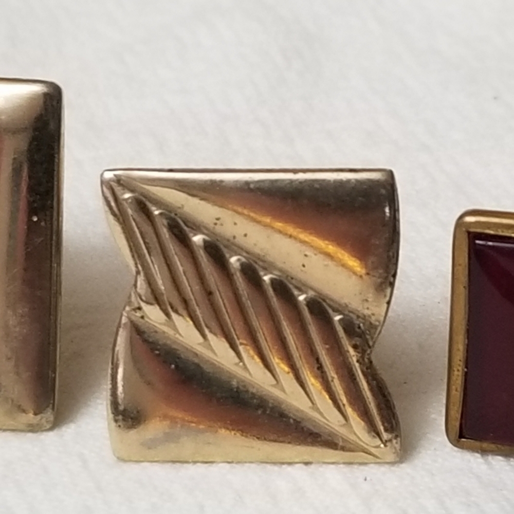 Three vintage cufflinks